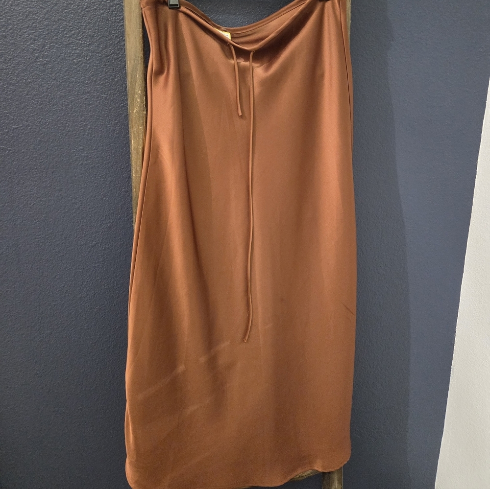 Orange satin midi length skirt size M/L